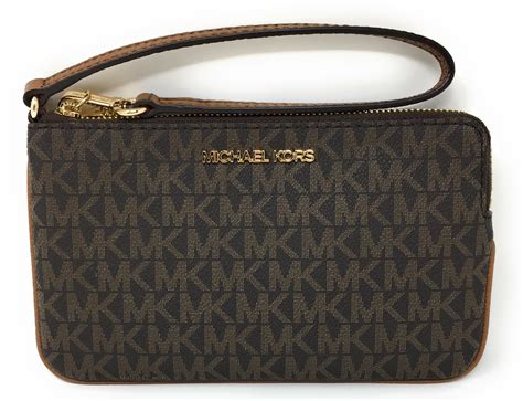 michael kors replica wristlet|Michael Kors large wristlet clutch.